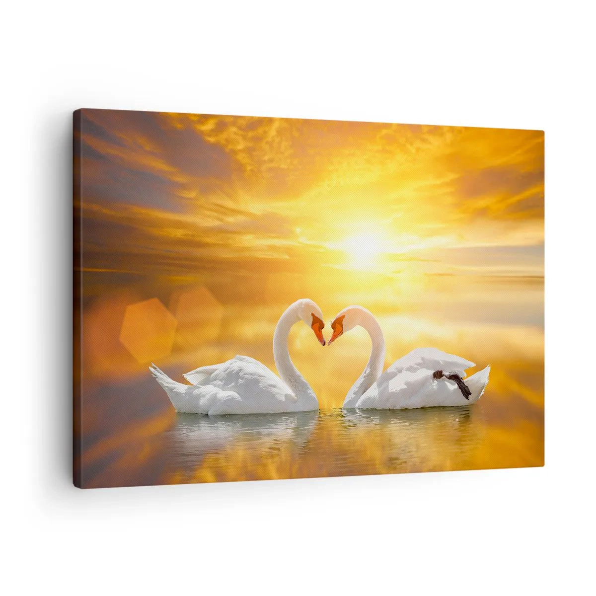 Impression sur toile - Image sur toile - Une scène romantique de deux cygnes formant un cœur sur fond de coucher de soleil doré. - 70x50cm - Le coeur est le plus beau mot du monde… - Décoration murale moderne pour le salon et la chambre ARTTOR