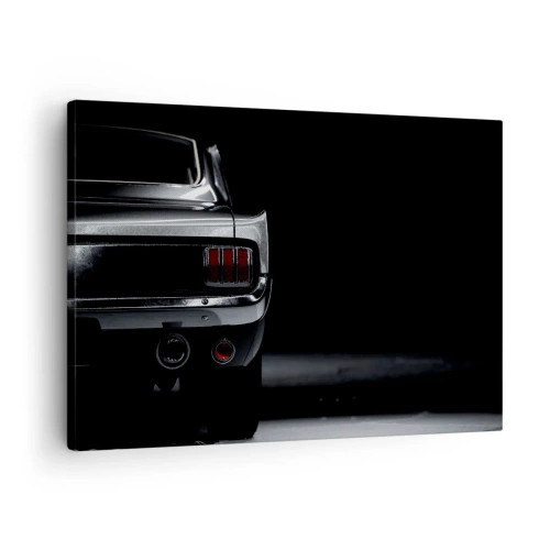 Impression sur toile - Image sur toile - Une image en noir et blanc de l'arrière d'une voiture classique sur un fond sombre. - 70x50cm - Le charme du classique - Décoration murale moderne pour le salon et la chambre ARTTOR