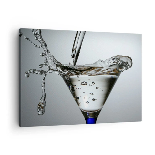 Impression sur toile - Image sur toile - Verre à Martini avec éclaboussures d'eau dynamiques sur fond clair. - 70x50cm - Sur le bord de la coupe - Décoration murale moderne pour le salon et la chambre ARTTOR