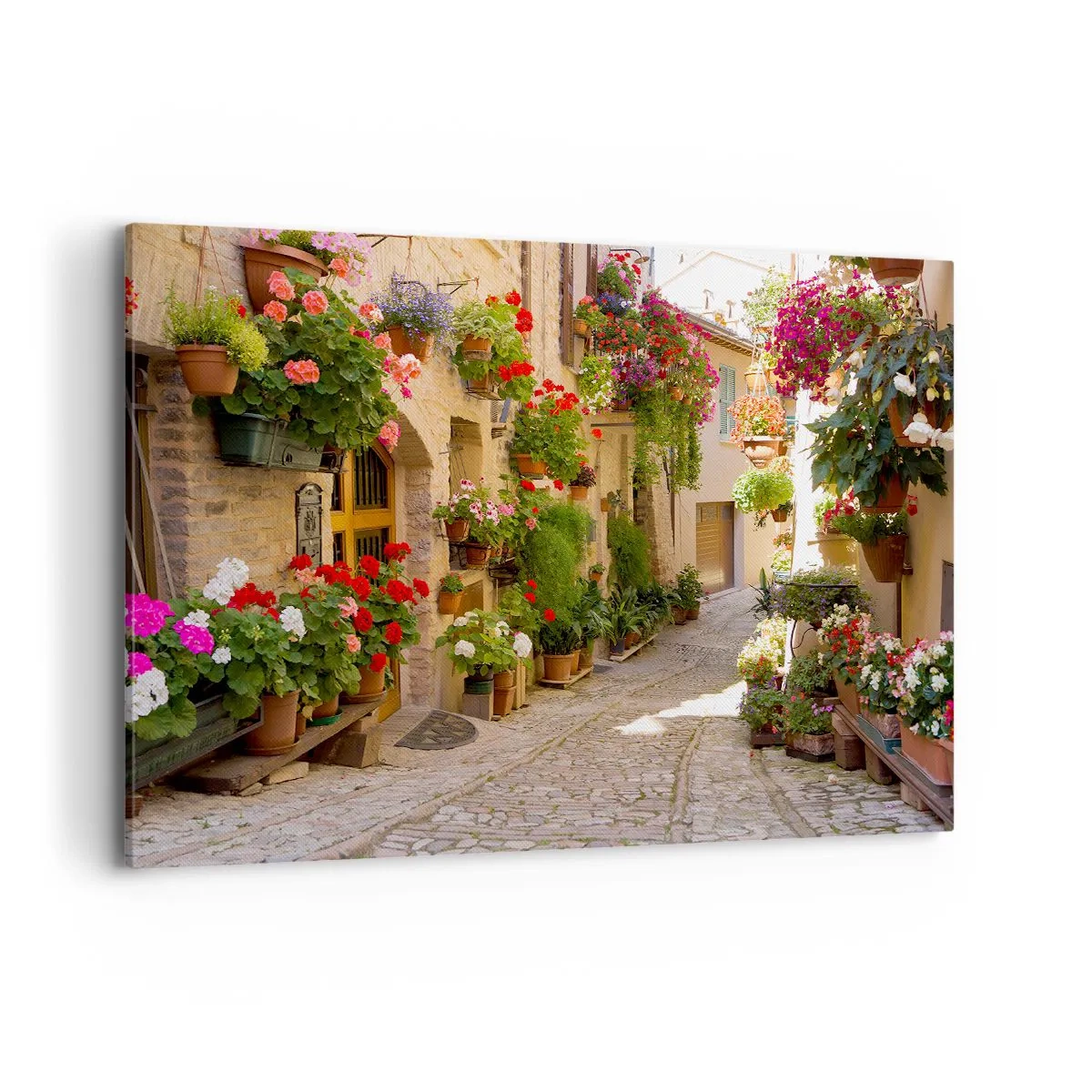 Impression sur toile - Image sur toile - Une rue avec des pots de fleurs et des murs de pierre - 100x70cm - Une inondation de fleurs  - Décoration murale moderne pour le salon et la chambre ARTTOR