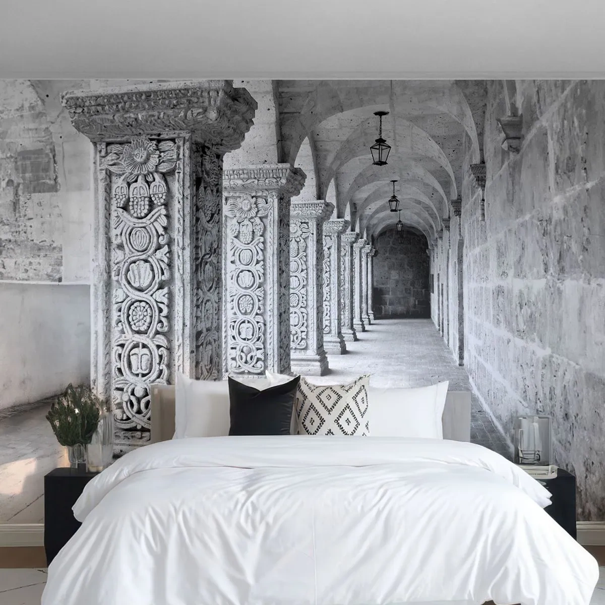 Papier Peint Photo Standard Eco - Colonnes en pierre avec ornementation dans un cloître monochrome - 100x70cm - Où cela mène-t-il…? - Décoration murale moderne pour le salon et la chambre ARTTOR