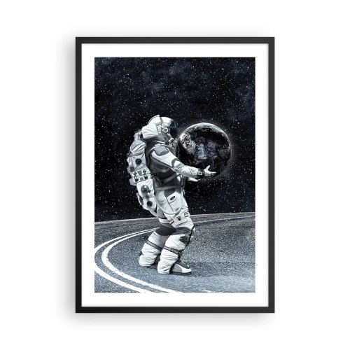 Affiche dans un cadre noir - Poster - Un astronaute dans l'espace tenant une sphère ressemblant à la Terre. - 50x70cm - Sur la Voie Lactée - Décoration murale moderne pour le salon et la chambre ARTTOR