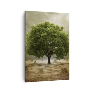 Impression sur toile - Image sur toile - Un arbre vert entouré de troncs d'arbres abattus contre un ciel nuageux - 70x100cm - Tout l'espoir - Décoration murale moderne pour le salon et la chambre ARTTOR