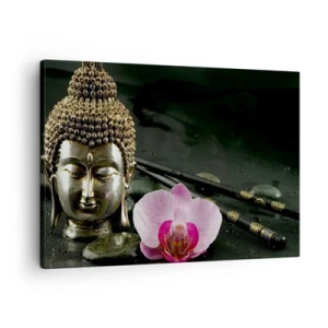 Impression sur toile - Image sur toile - Une statuette de Bouddha avec une orchidée et des baguettes sur un fond de pierres - 70x50cm - Harmonie de la sagesse et de la beauté - Décoration murale moderne pour le salon et la chambre ARTTOR