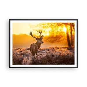 Affiche dans un cadre noir - Poster - Un cerf sur fond de forêt d'automne illuminée par le soleil doré - 100x70cm - Roi de la forêt automnal - Décoration murale moderne pour le salon et la chambre ARTTOR