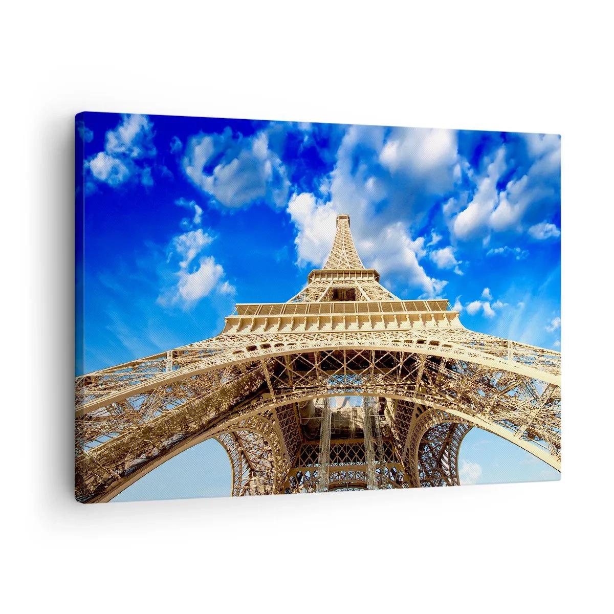 Impression sur toile - Image sur toile - La Tour Eiffel vue d'en bas contre un ciel bleu - 70x50cm - Atteindre le ciel et les nuages - Décoration murale moderne pour le salon et la chambre ARTTOR
