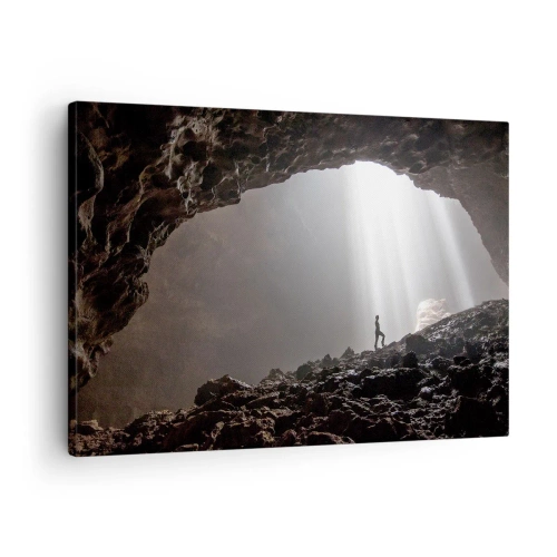 Impression sur toile - Image sur toile - Une figure dans une grotte éclairée par des rayons de lumière - 70x50cm - Grotte lumineuse - Décoration murale moderne pour le salon et la chambre ARTTOR