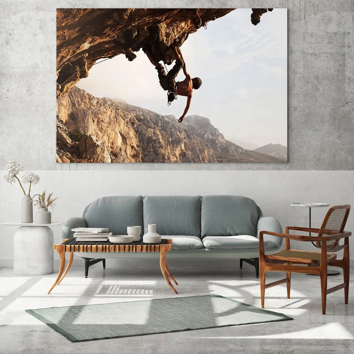 Impression sur verre - Image sur verre - Escalader un rocher vertical dans un paysage de montagne - 70x50cm - Le monde rétréci dans une main sur une coupe de rocher - Décoration murale moderne pour le salon et la chambre ARTTOR