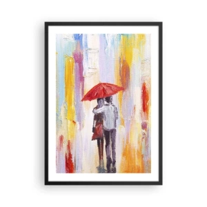 Affiche dans un cadre noir - Poster - Une scène romantique avec un couple sous un parapluie rouge sur fond de ville. - 50x70cm - Qu'il pleuve encore - Décoration murale moderne pour le salon et la chambre ARTTOR