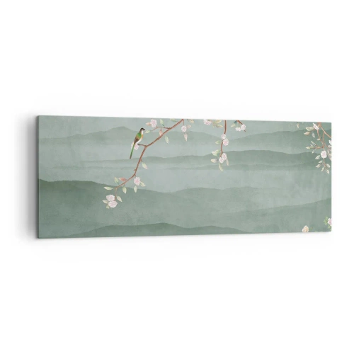 Impression sur toile - Image sur toile - Une image pittoresque d'une branche d'arbre en fleurs avec des oiseaux sur fond de collines verdoyantes. - 140x50cm - Printemps oh c'est toi - Décoration murale moderne pour le salon et la chambre ARTTOR