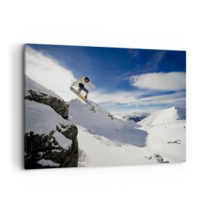 Impression sur toile - Image sur toile - Un snowboardeur saute d'une falaise avec des montagnes enneigées en arrière-plan. - 100x70cm - Liberté sans limite - Décoration murale moderne pour le salon et la chambre ARTTOR