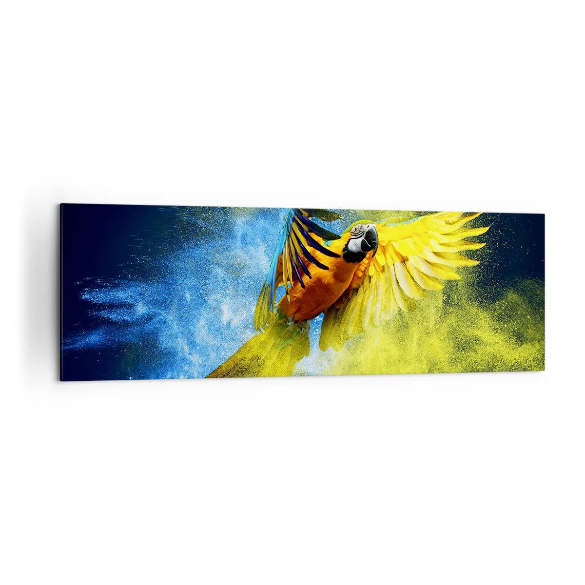 Impression sur toile - Image sur toile - Un perroquet en vol sur fond d'explosions colorées de jaune et de bleu. - 160x50cm - Dans la poussière bleue et dorée - Décoration murale moderne pour le salon et la chambre ARTTOR