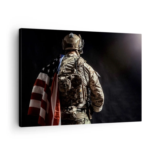 Impression sur toile - Image sur toile - Un soldat en uniforme avec un drapeau sur un fond sombre - 70x50cm - C'est exactement pour ça - Décoration murale moderne pour le salon et la chambre ARTTOR