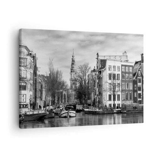 Impression sur toile - Image sur toile - Panorama noir et blanc d'Amsterdam avec canal et bâtiments historiques - 70x50cm - Climat d'Amsterdam - Décoration murale moderne pour le salon et la chambre ARTTOR