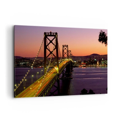 Impression sur toile - Image sur toile - Un pont illuminé la nuit au-dessus de l'eau avec une vue panoramique sur la ville - 100x70cm - Soirée violette - Décoration murale moderne pour le salon et la chambre ARTTOR