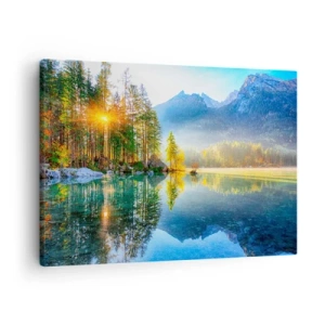 Impression sur toile - Image sur toile - Un lac entouré de montagnes et de forêts sous les rayons du soleil - 70x50cm - Majesté et douceur - Décoration murale moderne pour le salon et la chambre ARTTOR