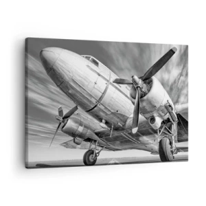 Impression sur toile - Image sur toile - Une image en noir et blanc d'un avion classique avec des détails structurels visibles. - 70x50cm - Toujours prêt à voler - Décoration murale moderne pour le salon et la chambre ARTTOR