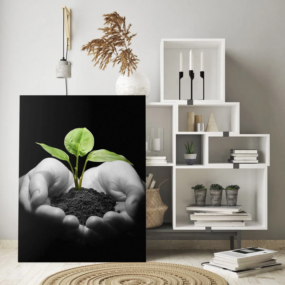 Impression sur verre - Image sur verre - Une jeune plante dans les mains sur un fond noir - 50x70cm - J'aime la nature, je la protège - Décoration murale moderne pour le salon et la chambre ARTTOR