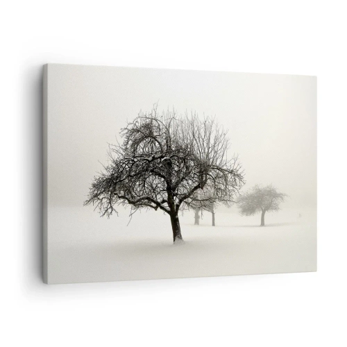 Impression sur toile - Image sur toile - Arbres dans un champ enneigé entouré de brouillard - 70x50cm - Un rêve hivernal - Décoration murale moderne pour le salon et la chambre ARTTOR