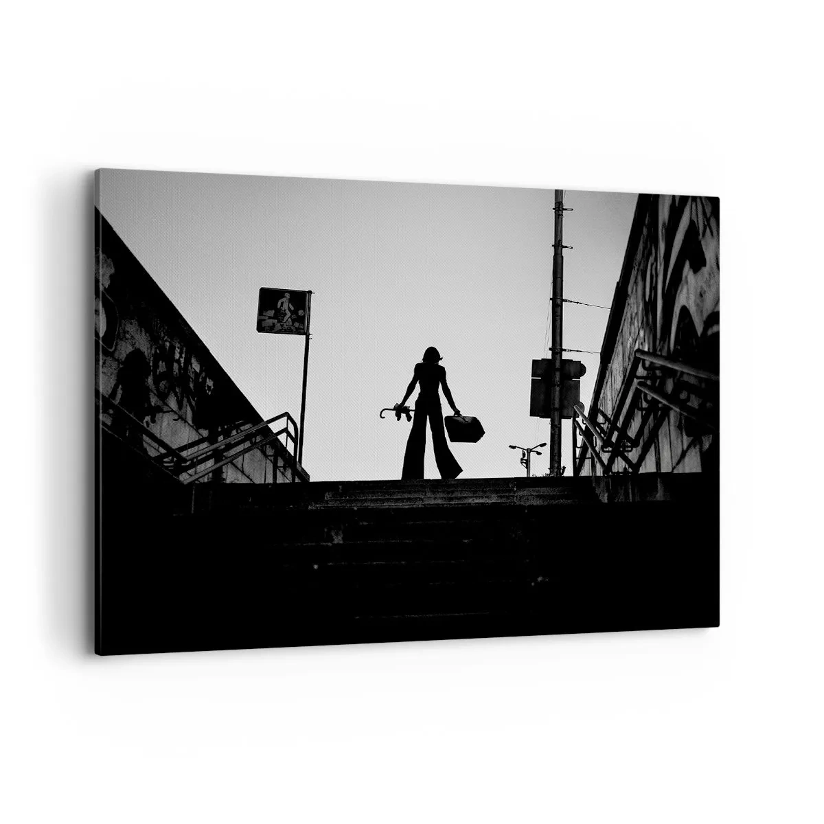 Impression sur toile - Image sur toile - Une figure de femme dans les escaliers en noir et blanc avec une atmosphère dynamique - 100x70cm - Pèlerinage urbain - Décoration murale moderne pour le salon et la chambre ARTTOR