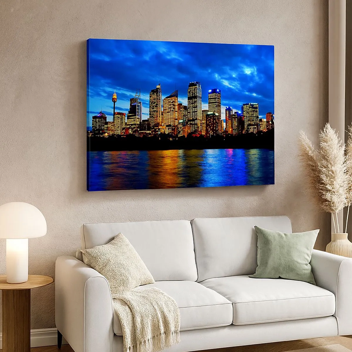 Impression sur toile - Image sur toile - Panorama de la ville nocturne avec des gratte-ciel illuminés au-dessus de l'eau - 70x50cm - Une nuit de lumières et de couleurs - Décoration murale moderne pour le salon et la chambre ARTTOR