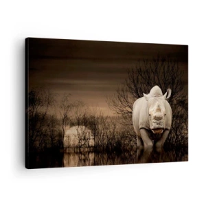 Impression sur toile - Image sur toile - Rhinocéros parmi les arbres au coucher du soleil, nature sauvage. - 70x50cm - Blanc contre nature - Décoration murale moderne pour le salon et la chambre ARTTOR
