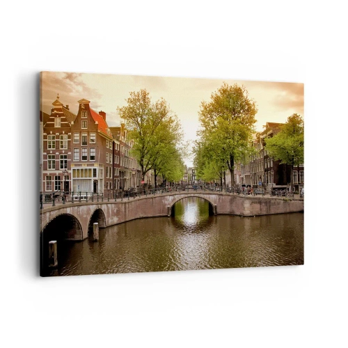 Impression sur toile - Image sur toile - Un canal à Amsterdam entouré d'immeubles historiques - 100x70cm - En bateau ou à vélo ? - Décoration murale moderne pour le salon et la chambre ARTTOR