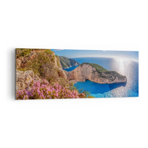 Impression sur toile - Image sur toile - Une falaise fleurie, une mer turquoise et un paysage grec ensoleillé - 140x50cm - Mes super vacances grecques - Décoration murale moderne pour le salon et la chambre ARTTOR