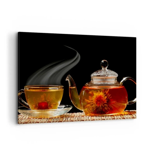 Impression sur toile - Image sur toile - Théière en verre avec thé aux fleurs et une tasse - 100x70cm - La magie et l'art de l'infusion du thé - Décoration murale moderne pour le salon et la chambre ARTTOR