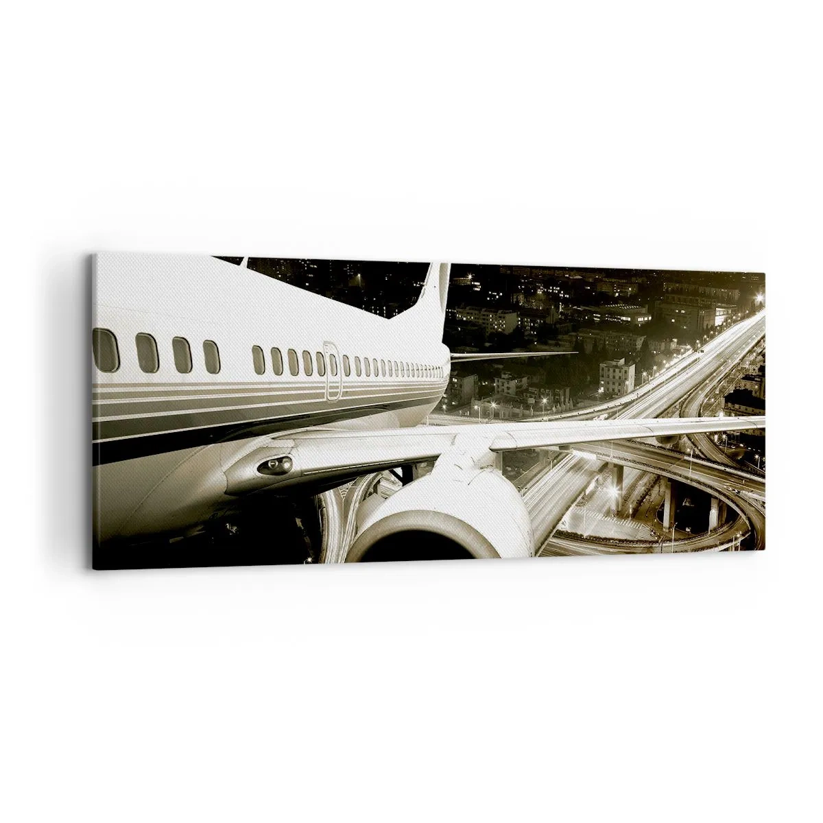 Impression sur toile - Image sur toile - Un avion au-dessus d'une ville nocturne avec des autoroutes illuminées - 120x50cm - Vole dans la nuit - Décoration murale moderne pour le salon et la chambre ARTTOR