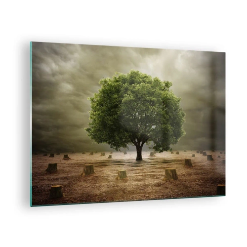 Impression sur verre - Image sur verre - Un arbre vert entouré de troncs contre un ciel sombre - 70x50cm - Tout l'espoir - Décoration murale moderne pour le salon et la chambre ARTTOR