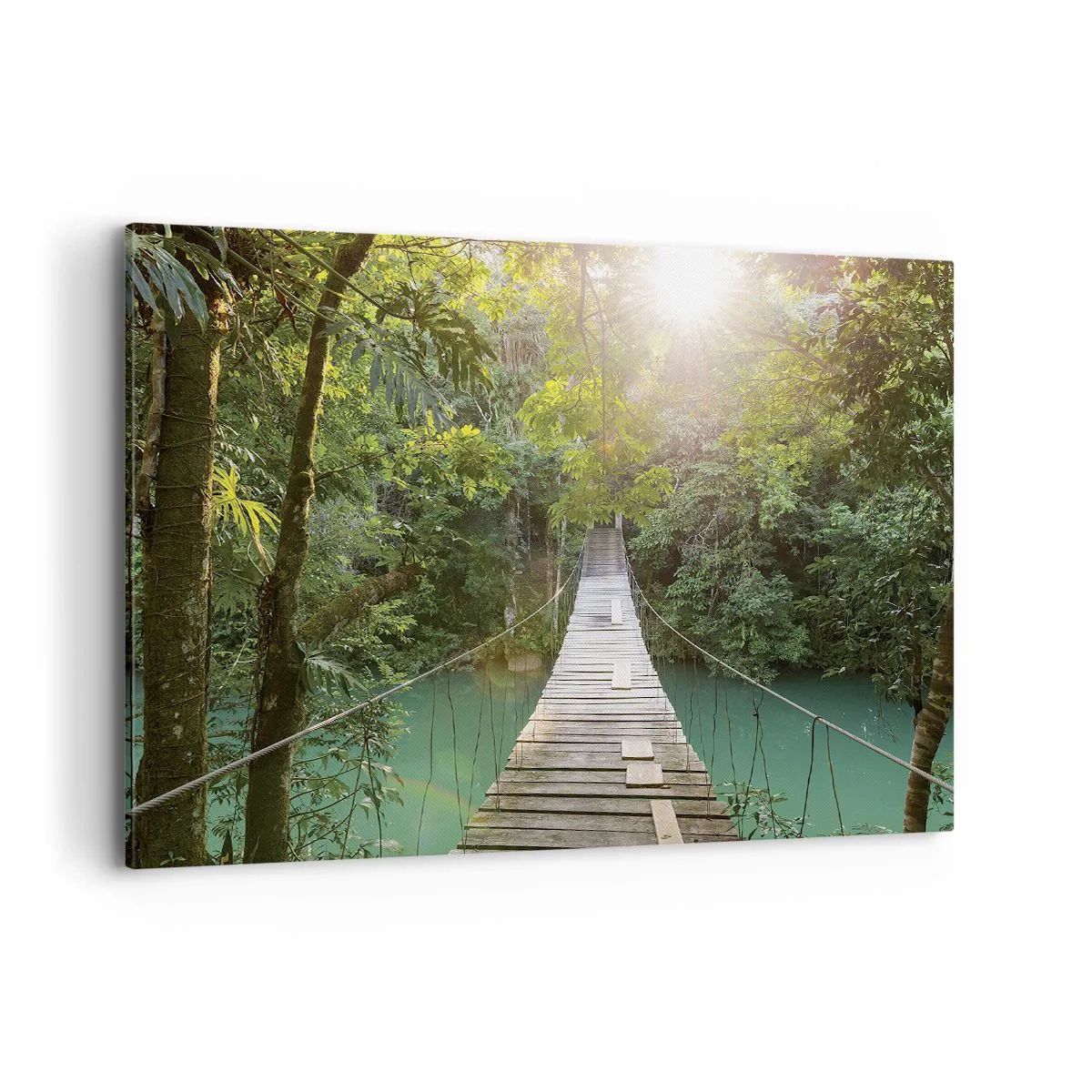 Impression sur toile - Image sur toile - Un pont suspendu dans une forêt tropicale illuminée par la lumière du soleil. - 100x70cm - De l'eau azur à la forêt azur - Décoration murale moderne pour le salon et la chambre ARTTOR