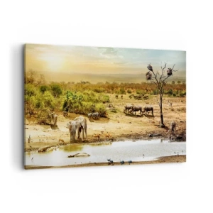 Impression sur toile - Image sur toile - Éléphants et animaux sauvages à un point d'eau au coucher du soleil - 120x80cm - "Et d'Eden coulait une rivière..." - Décoration murale moderne pour le salon et la chambre ARTTOR