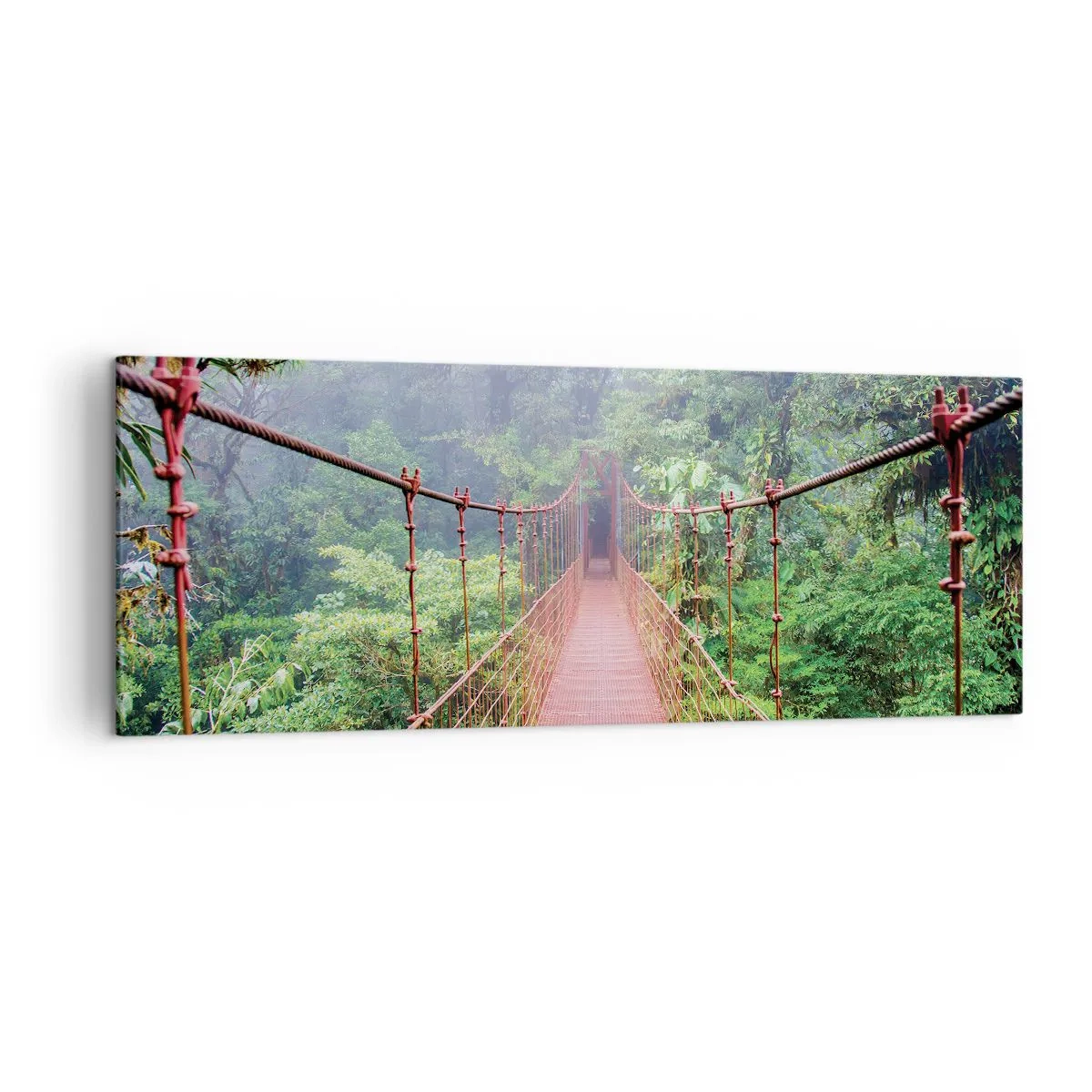 Impression sur toile - Image sur toile - Un pont suspendu dans une jungle tropicale entourée de brouillard - 140x50cm - Suspendu sur les couronnes - Décoration murale moderne pour le salon et la chambre ARTTOR