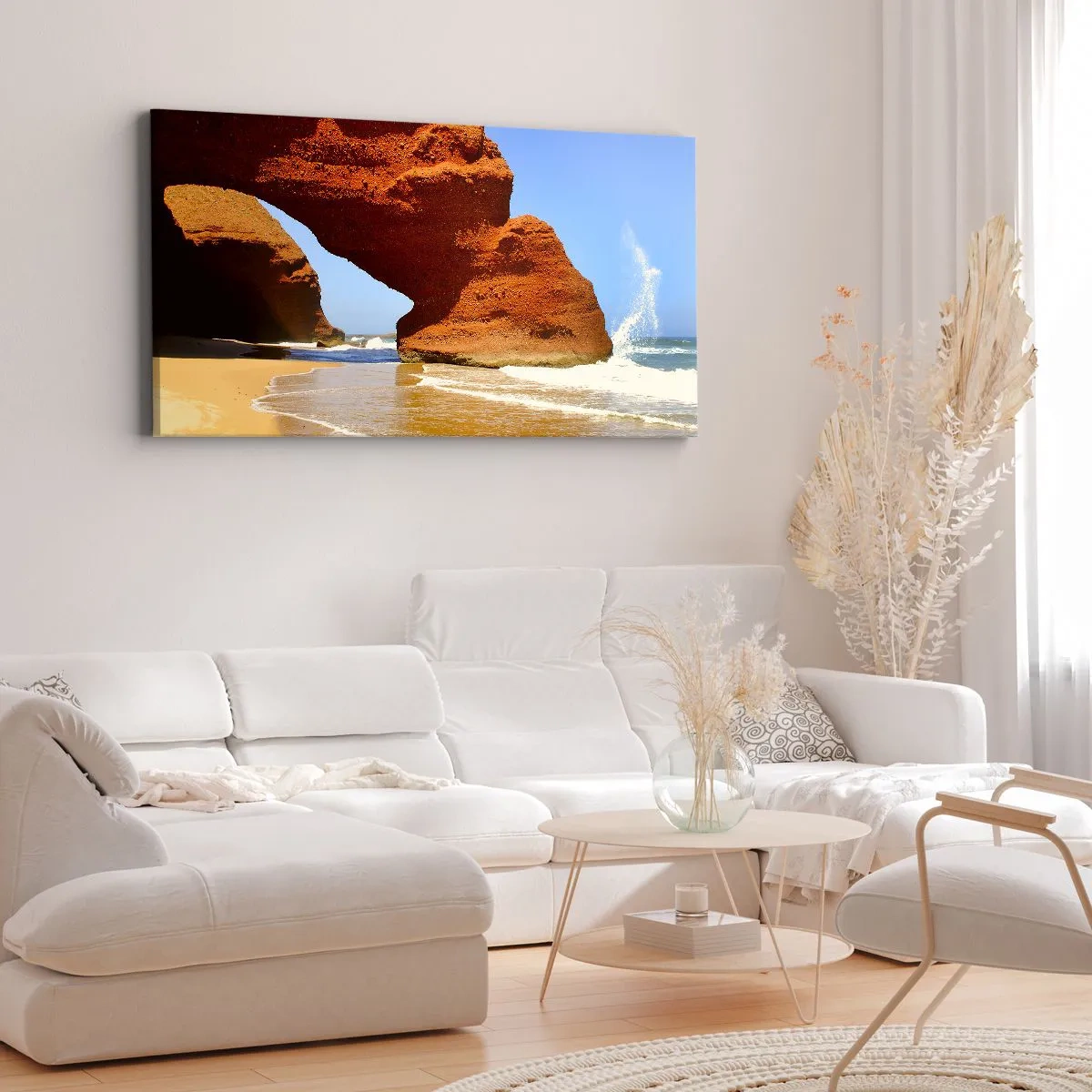 Impression sur toile - Image sur toile - Une arche rocheuse naturelle sur une plage avec un ciel bleu et des vagues - 140x50cm - L'eau et le vent depuis des milliers d'années - Décoration murale moderne pour le salon et la chambre ARTTOR