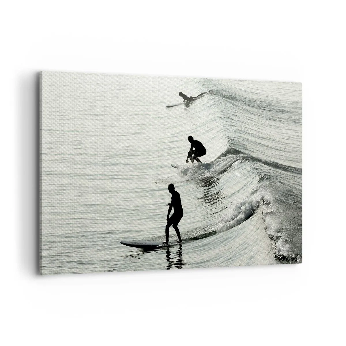Impression sur toile - Image sur toile - Surfeurs sur les vagues dans une photo monochrome - 100x70cm - A la rencontre de la vague - Décoration murale moderne pour le salon et la chambre ARTTOR