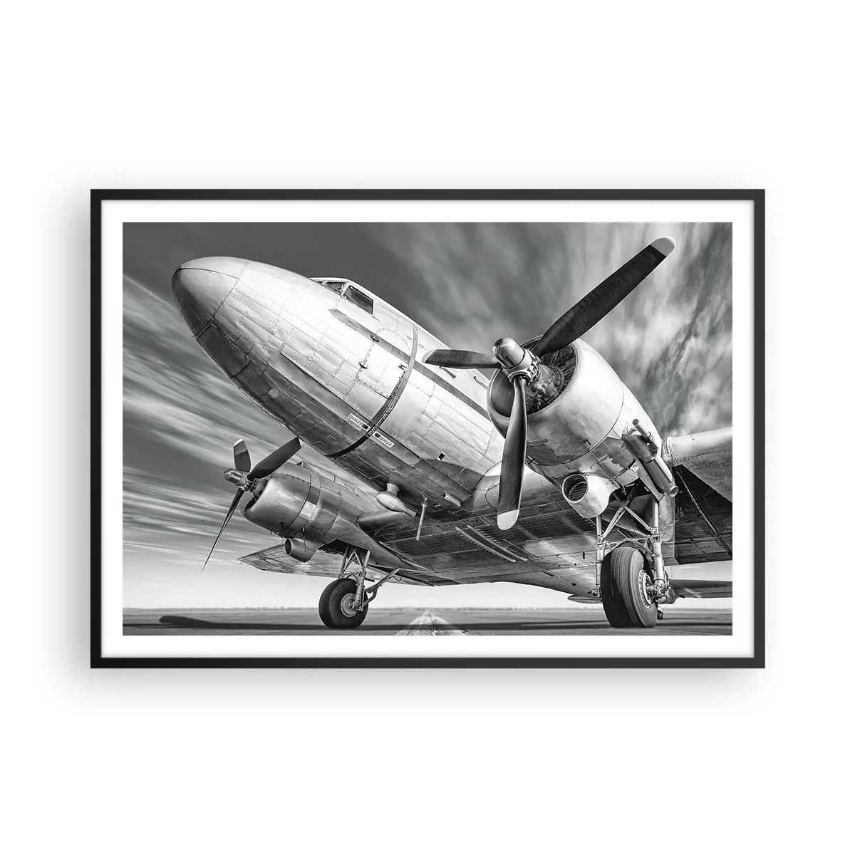 Affiche dans un cadre noir - Poster - Une image en noir et blanc d'un avion classique avec des détails structurels visibles. - 100x70cm - Toujours prêt à voler - Décoration murale moderne pour le salon et la chambre ARTTOR