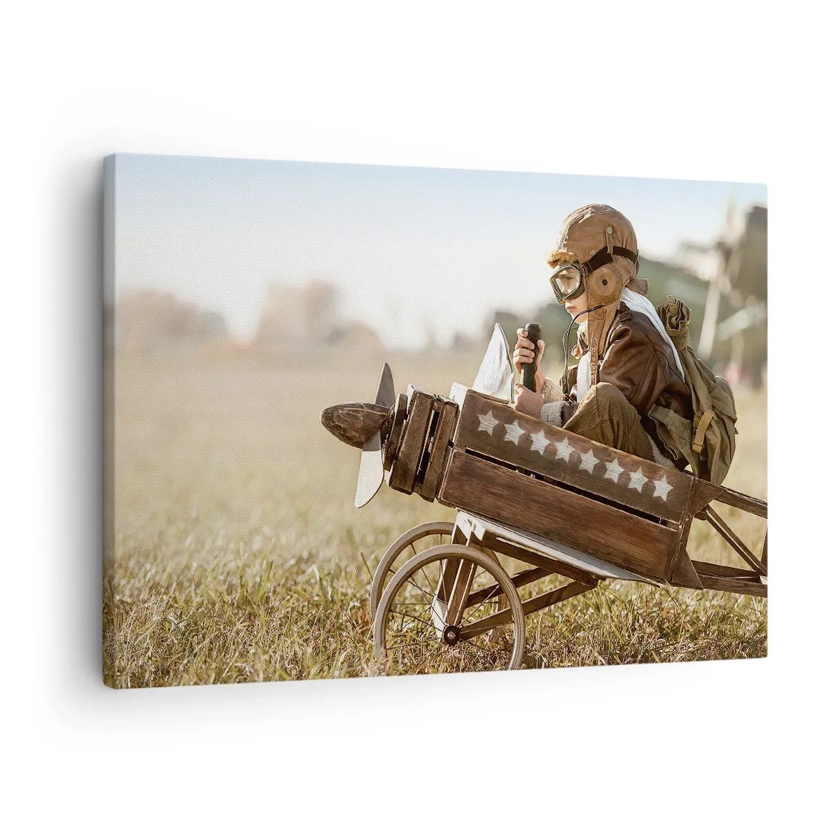 Impression sur toile - Image sur toile - Un enfant dans un avion jouet avec un champ en arrière-plan - 70x50cm - Départ vers un rêve - Décoration murale moderne pour le salon et la chambre ARTTOR