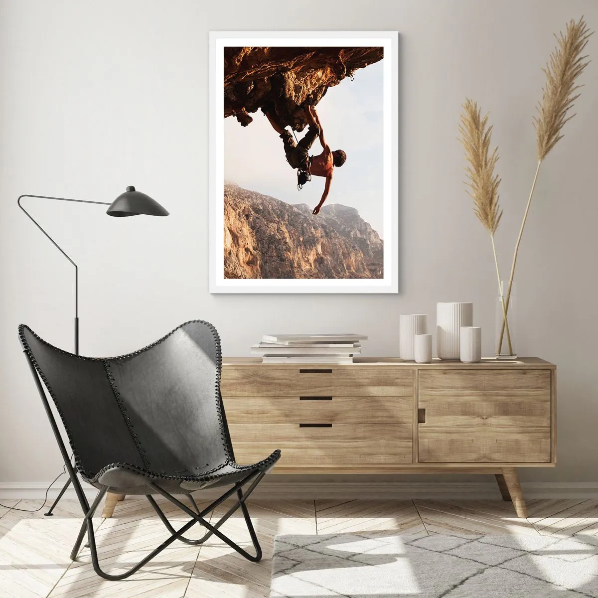 Affiche dans un cadre blanc - Poster - Le monde rétréci dans une main sur une coupe de rocher - 70x100 cm