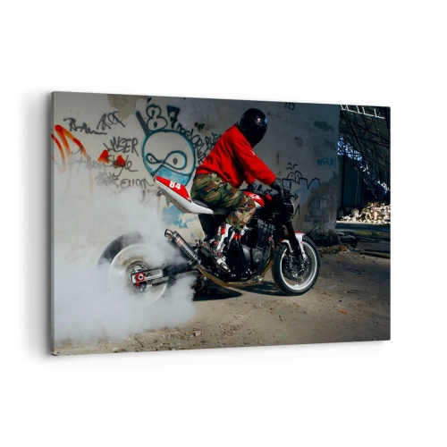 Impression sur toile - Image sur toile - Un motard effectue un drift spectaculaire dans un bâtiment abandonné couvert de graffitis. - 120x80cm - Pourchassez moi! - Décoration murale moderne pour le salon et la chambre ARTTOR