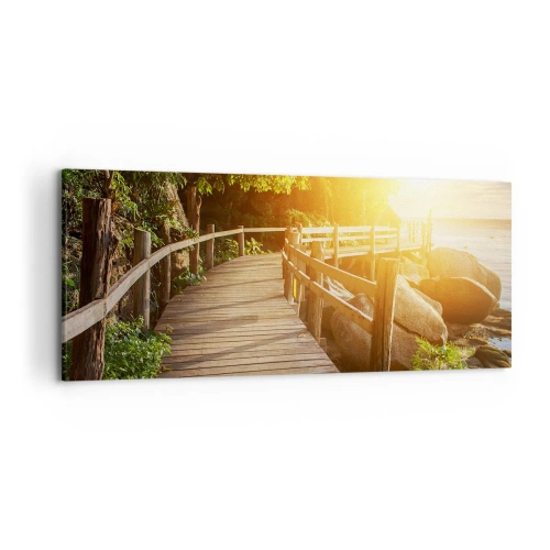 Impression sur toile - Image sur toile - Un pont en bois au milieu de la verdure menant à la mer sous les rayons du soleil - 120x50cm - Un autre tour, un autre miracle - Décoration murale moderne pour le salon et la chambre ARTTOR