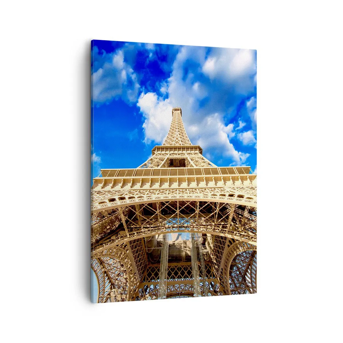 Impression sur toile - Image sur toile - La Tour Eiffel vue d'en bas contre un ciel bleu - 50x70cm - Atteindre le ciel et les nuages - Décoration murale moderne pour le salon et la chambre ARTTOR