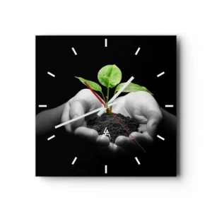 Horloge murale - Pendule murale - Mains tenant une plante verte sur fond noir - 30x30cm - J'aime la nature, je la protège - Décoration murale moderne pour le salon et la chambre ARTTOR