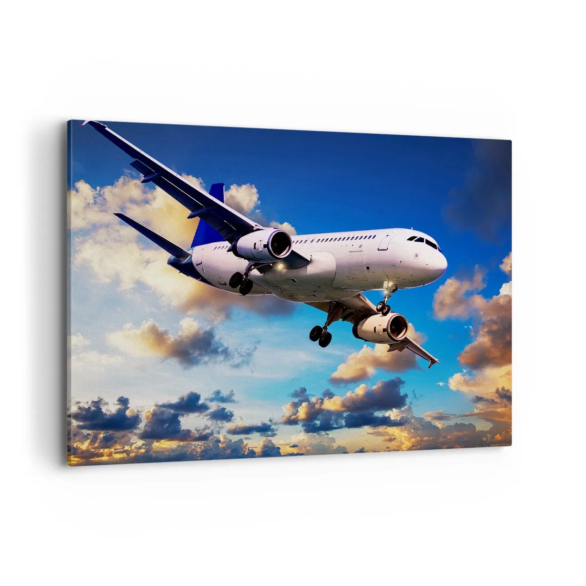 Impression sur toile - Image sur toile - Un avion de ligne contre les nuages au coucher du soleil - 100x70cm - Un voyage en blanc et bleu ciel - Décoration murale moderne pour le salon et la chambre ARTTOR