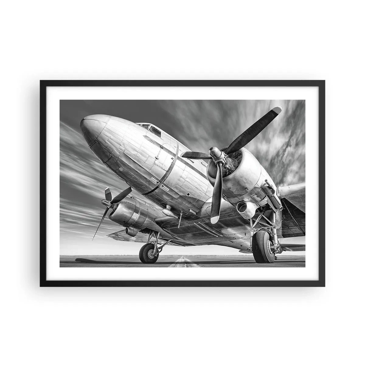 Affiche dans un cadre noir - Poster - Une image en noir et blanc d'un avion classique avec des détails structurels visibles. - 70x50cm - Toujours prêt à voler - Décoration murale moderne pour le salon et la chambre ARTTOR