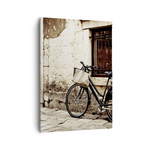 Impression sur toile - Image sur toile - Un vélo contre un mur de pierre avec une fenêtre et une porte de style rétro - 50x70cm - Retour au passé - Décoration murale moderne pour le salon et la chambre ARTTOR