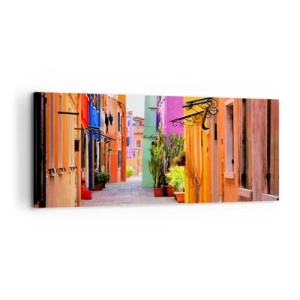 Impression sur toile - Image sur toile - Une rue colorée avec des immeubles aux tons clairs - 120x50cm - Allée arc-en-ciel - Décoration murale moderne pour le salon et la chambre ARTTOR