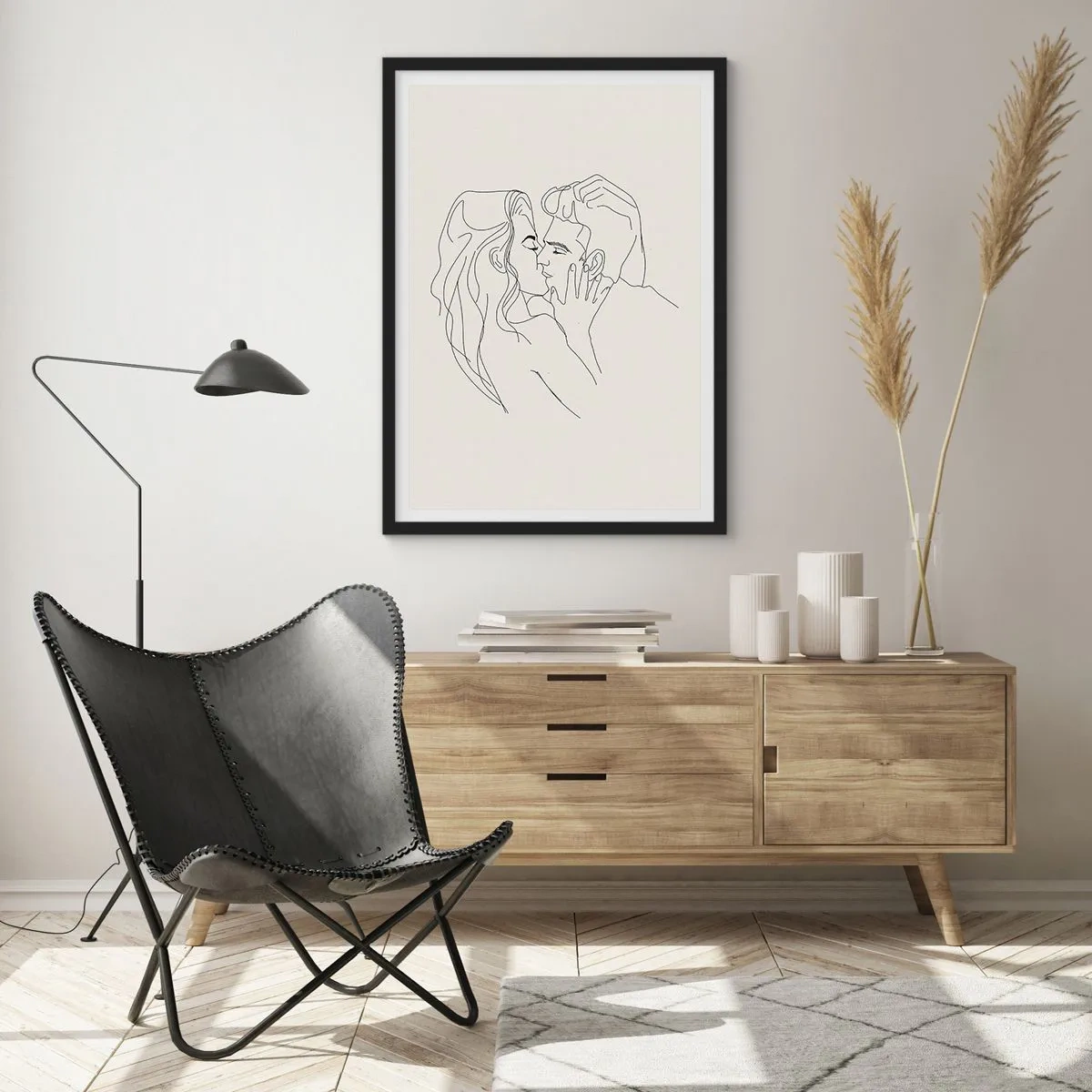 Affiche dans un cadre noir - Poster - Un dessin minimaliste d'un couple amoureux aux lignes délicates. - 50x70cm - Enlacé de sentiment - Décoration murale moderne pour le salon et la chambre ARTTOR
