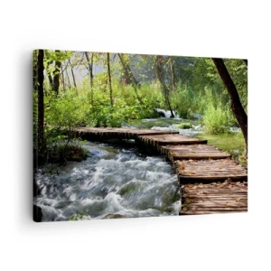 Impression sur toile - Image sur toile - Un pont en bois sur un ruisseau tumultueux entouré par la verdure de la forêt. - 70x50cm - Au-dessus de la cascade mousseuse - Décoration murale moderne pour le salon et la chambre ARTTOR