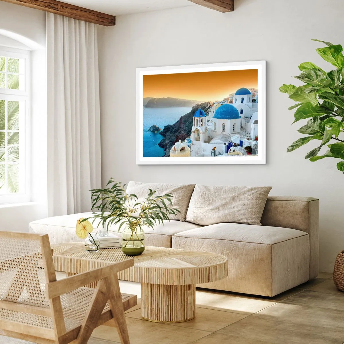Affiche dans un cadre blanc - Poster - Santorin - blotti contre les rochers - 70x50 cm